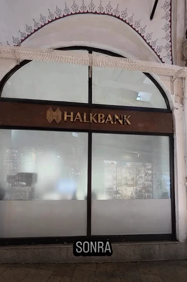 Renewed Halkbank shopfront beneath an arch